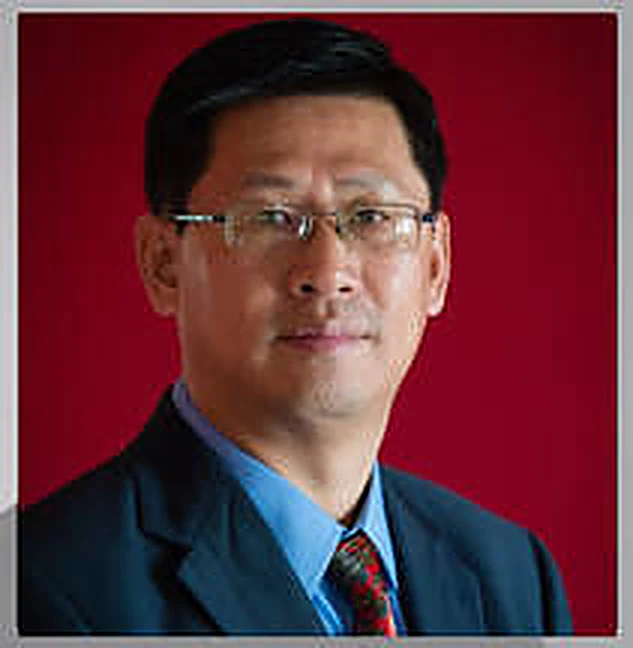 Dr. Lee Zhao, dentist and owner of Easy Dental Care Center in Norcross, GA